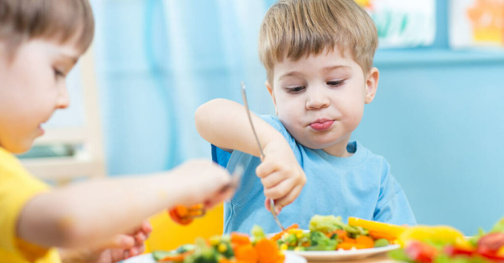 Children with Autism eating vegetables